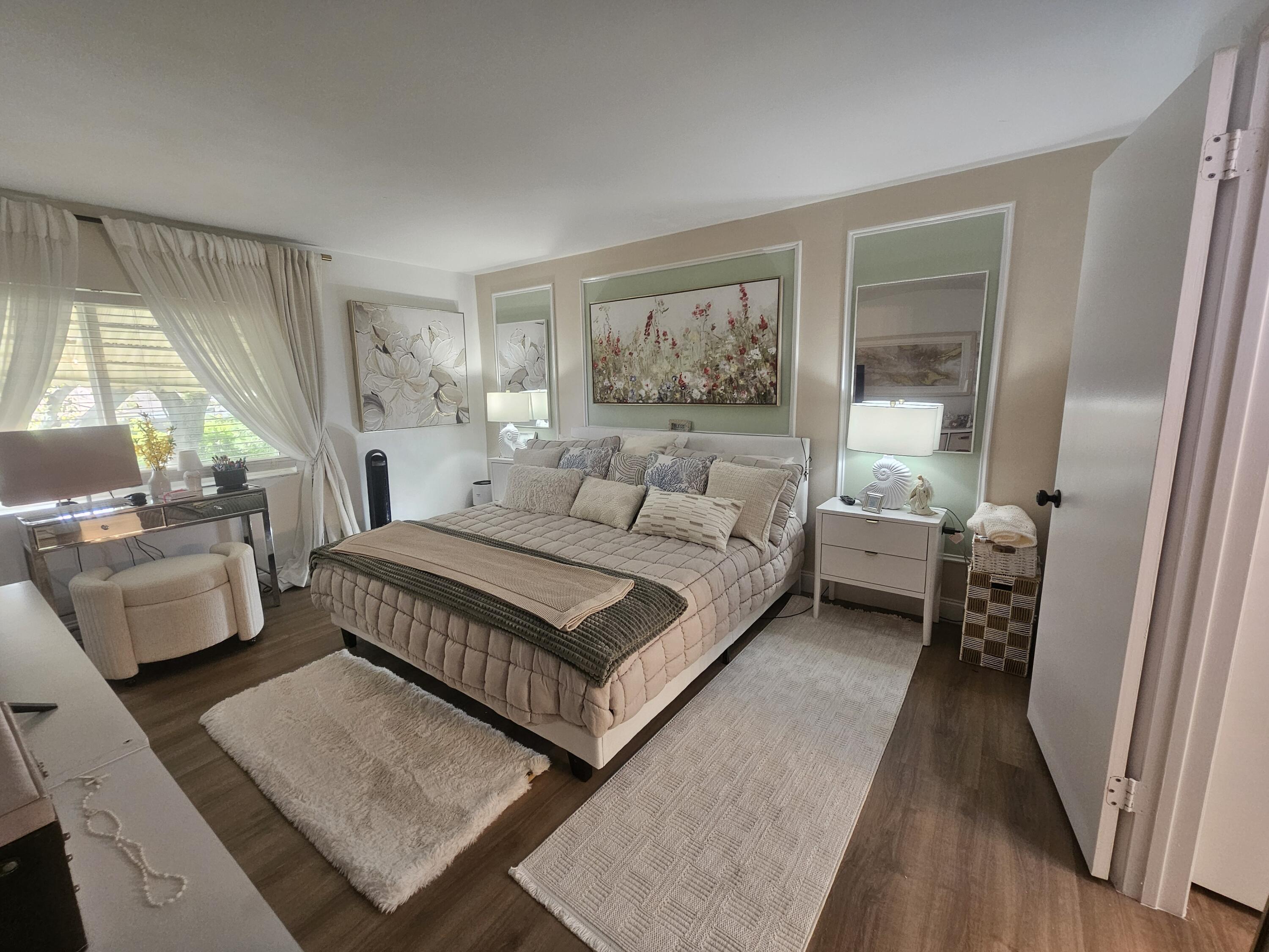 312 Pine Ridge Circle, Unit A2 Greenacres, FL 33463 - Photo 19 of 73 Master Bedroom