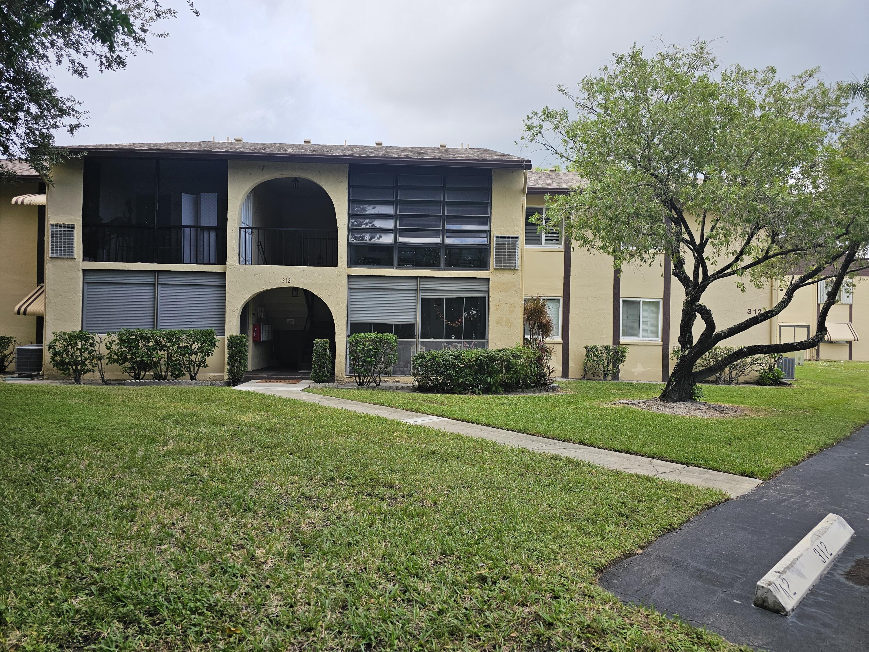312 Pine Ridge Circle, Unit A2 Greenacres, FL 33463 - Photo 52 of 62 First Parking front of unit