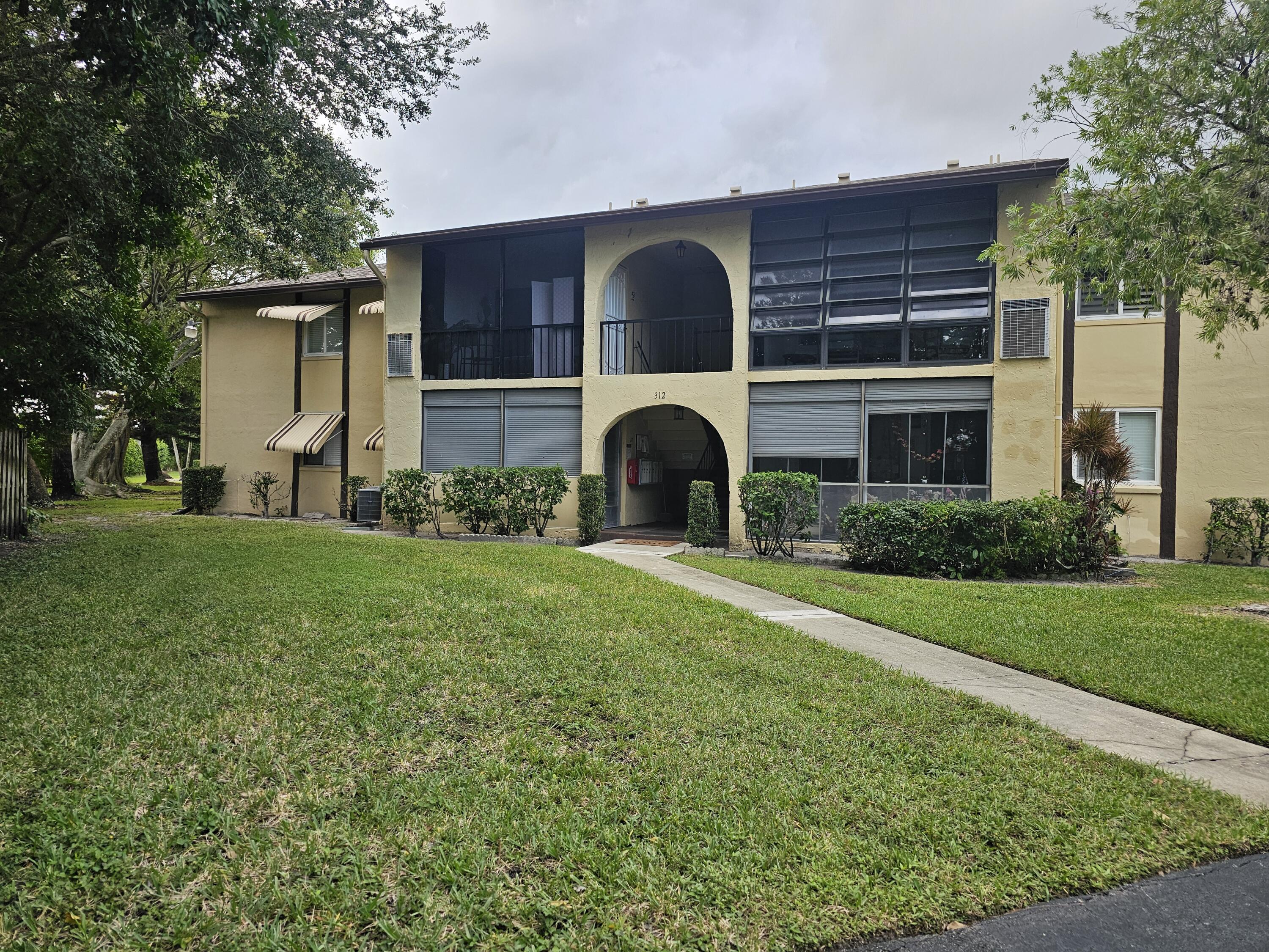 312 Pine Ridge Circle, Unit A2 Greenacres, FL 33463 - Photo 57 of 73 Front of Building