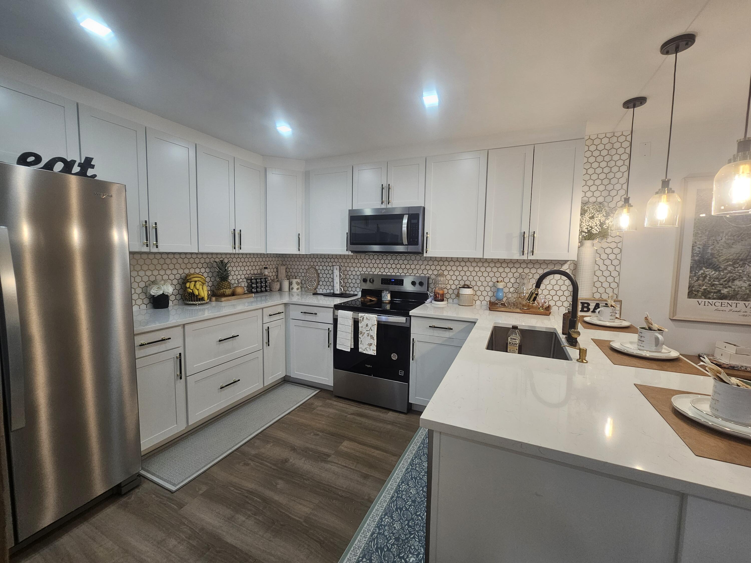 312 Pine Ridge Circle, Unit A2 Greenacres, FL 33463 - Photo 9 of 62 Lots of counter space