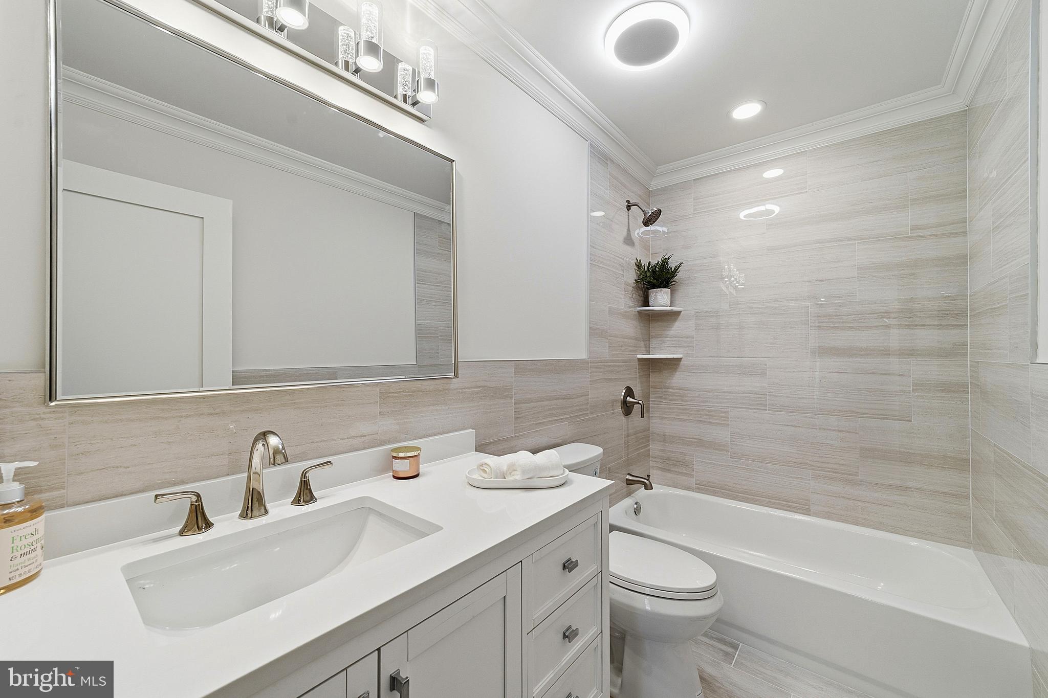 780 Ardmore Road Monroe Township, NJ 08831 - Photo 20 of 30 a bathroom with a sink a toilet and shower