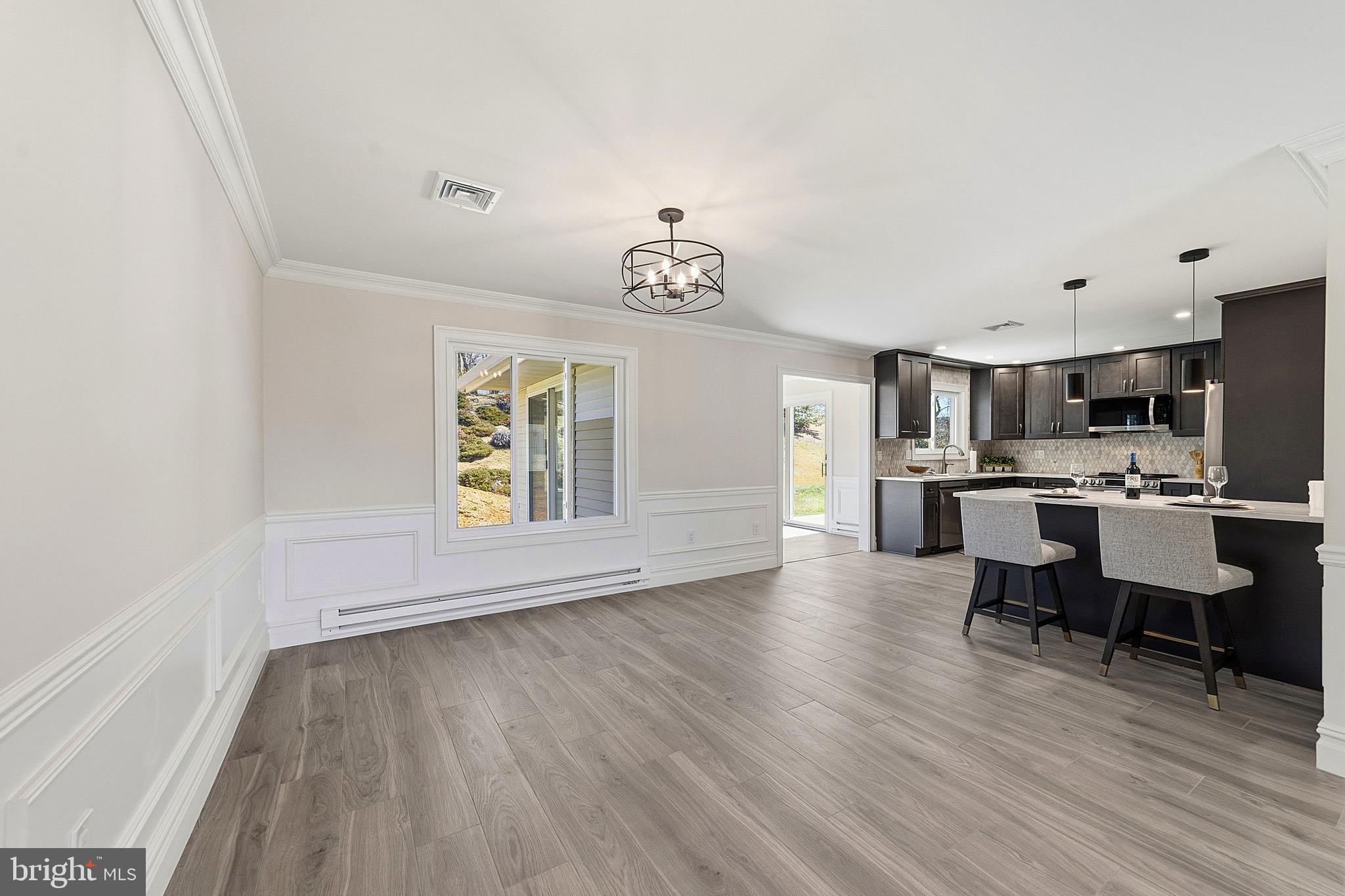 780 Ardmore Road Monroe Township, NJ 08831 - Photo 5 of 30 a view of kitchen with furniture and wooden floor