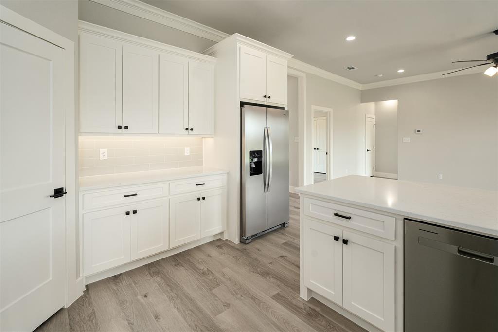 509 Limestone Circle Mabank, TX 75147 - Photo 12 of 36 a view of kitchen with wooden floor