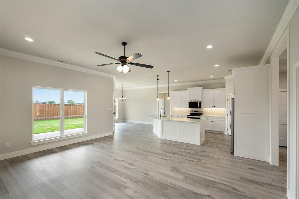 509 Limestone Circle Mabank, TX 75147 - Photo 5 of 36 a view of kitchen with sink and wooden floor