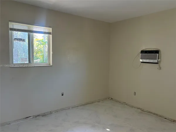 an empty room with a window