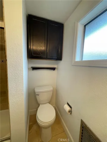 a bathroom with a toilet