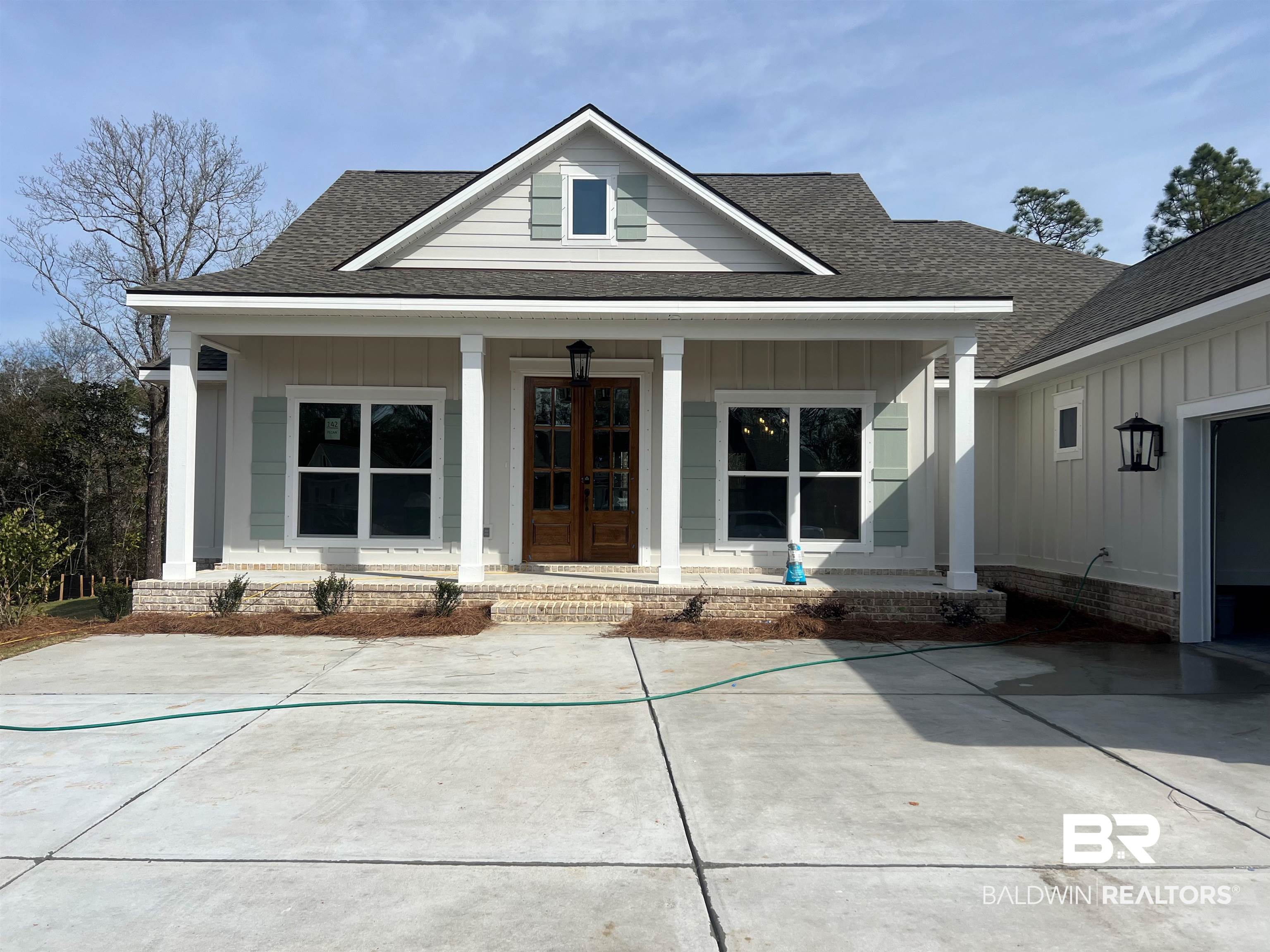 12210 Exbury Way Daphne, AL 36527 - Photo 1 of 1 Exterior space featuring french doors and covered porch