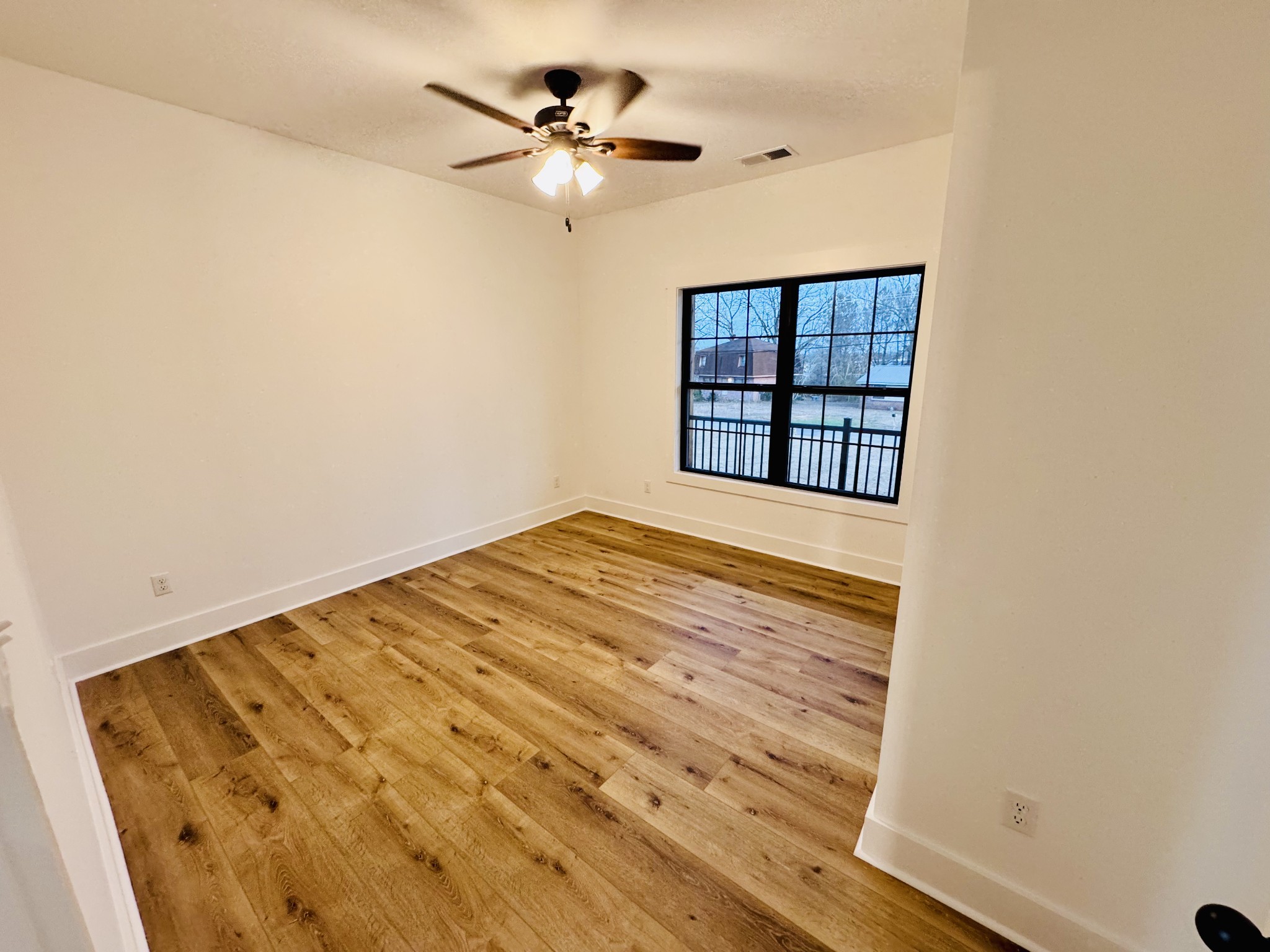 62 Hall Street Lexington, TN 38351 - Photo 19 of 48 a view of an empty room with a window