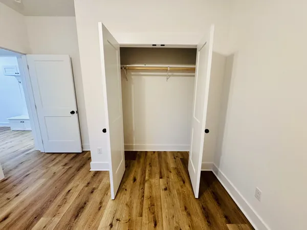 a kitchen with kitchen island sink refrigerator and stove