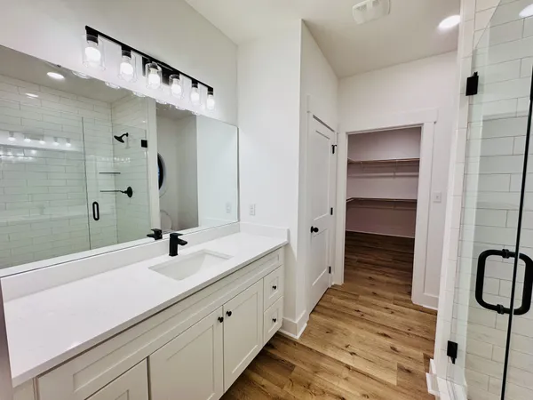 a bathroom with a toilet and a sink