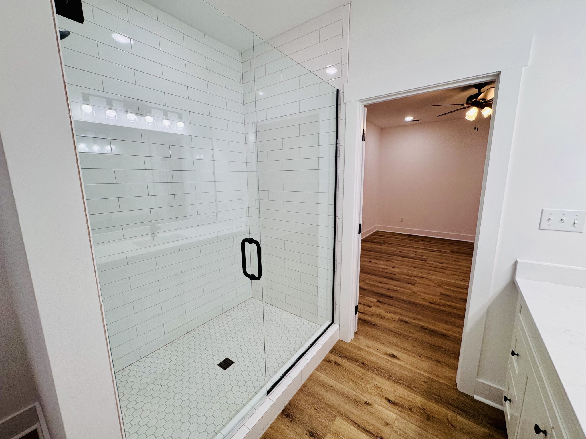 62 Hall Street Lexington, TN 38351 - Photo 38 of 48 a bathroom with a shower and a mirror
