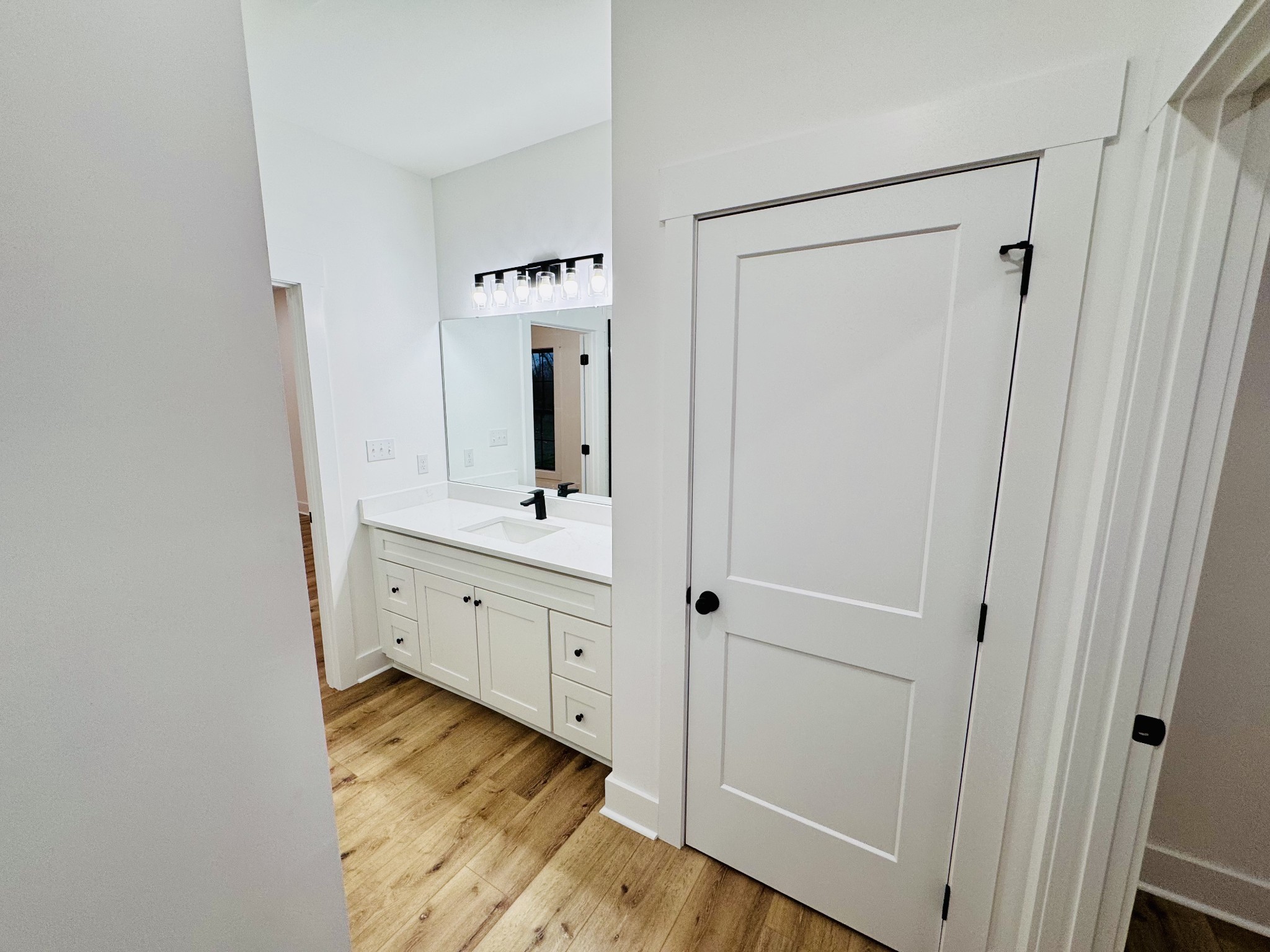 62 Hall Street Lexington, TN 38351 - Photo 40 of 48 a bathroom with a sink and mirror