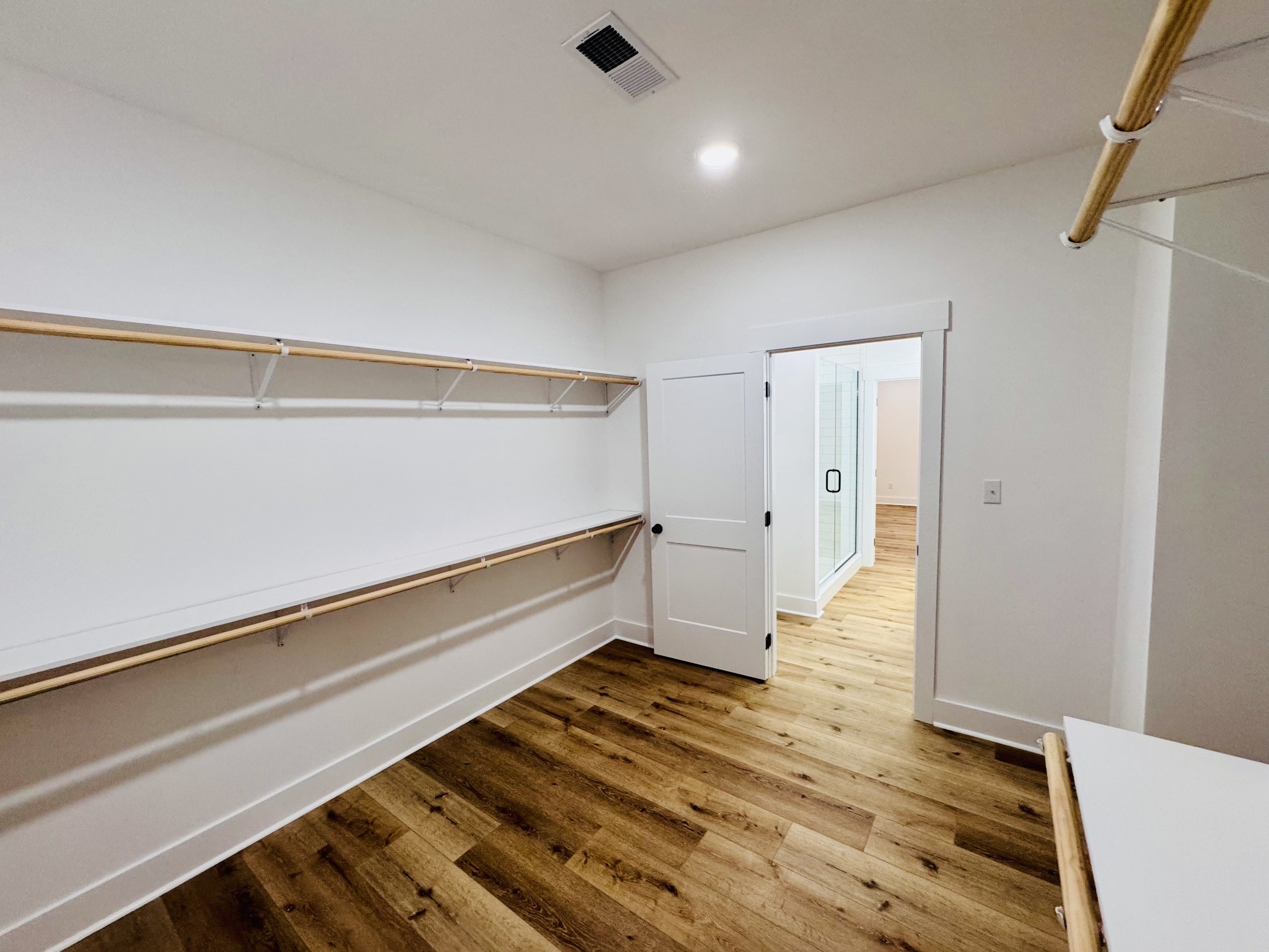 62 Hall Street Lexington, TN 38351 - Photo 43 of 48 a view of an empty room with wooden floor and a window