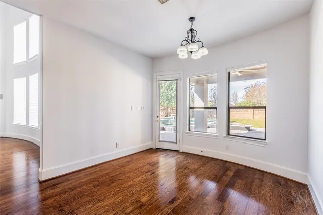 a kitchen with a sink and a refrigerator