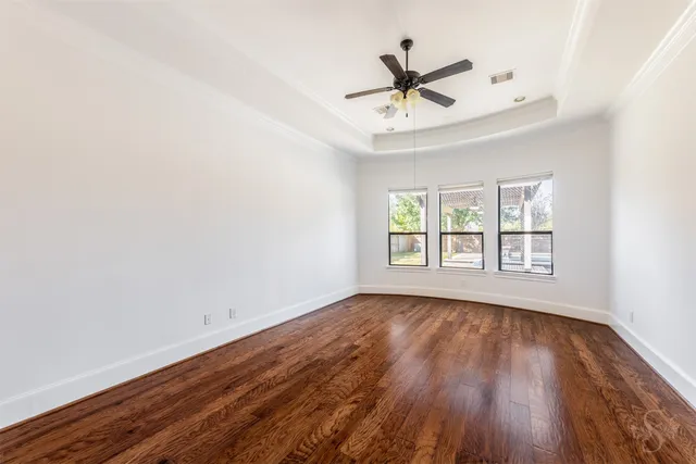 a large spacious bathroom with a tub sink double vanity granite tub shower and mirror