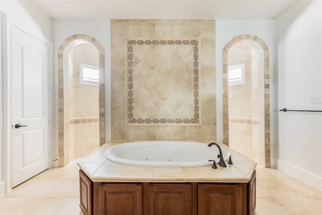 a bathroom with a sink double vanity and a mirror