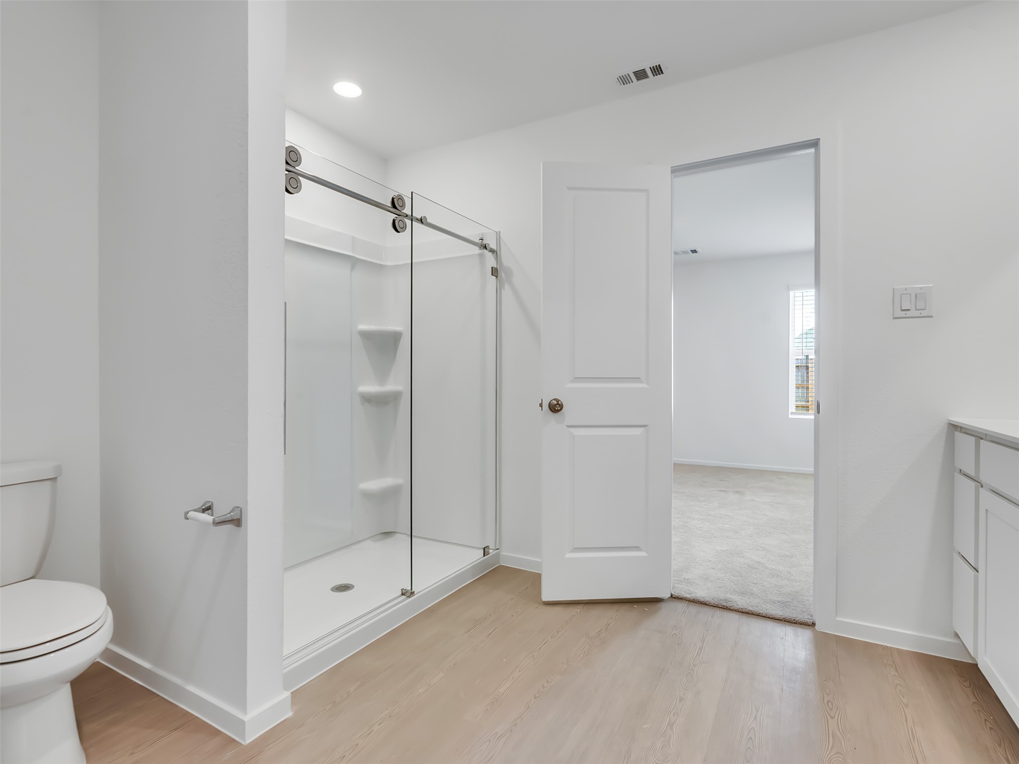 3041 Colusa Rdg Drive Katy, TX 77493 - Photo 11 of 26 a bathroom with a shower and a toilet