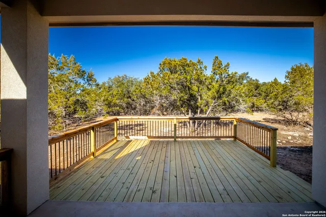 swimming view from balcony with furniture