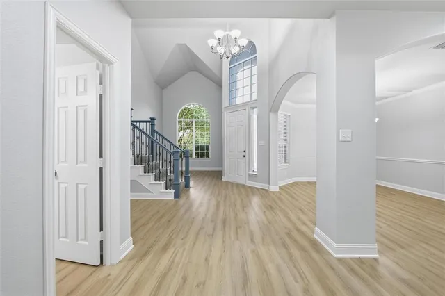 a view of entryway with wooden floor