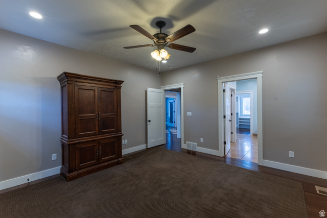 3565 West 1350th Street North Vernal, UT 84078 - Photo 19 of 54 Spacious room featuring neutral painted walls, recessed lighting, and a ceiling fan with integrated light fixture