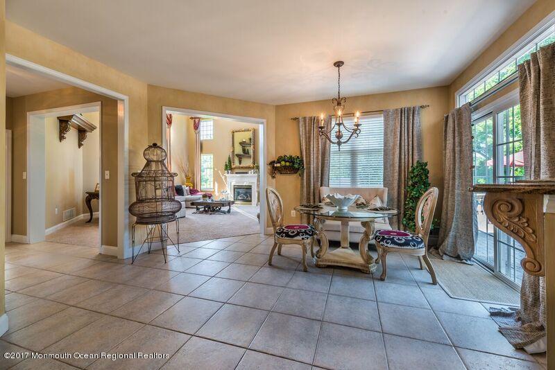 8 Rodeo Drive Jackson, NJ 08527 - Photo 12 of 54 a living room filled with furniture