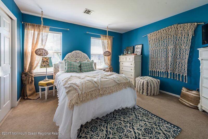 8 Rodeo Drive Jackson, NJ 08527 - Photo 23 of 54 a bedroom with a bed and a window