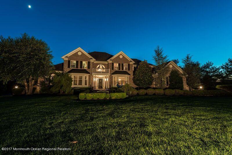8 Rodeo Drive Jackson, NJ 08527 - Photo 50 of 54 a front view of a house with a garden