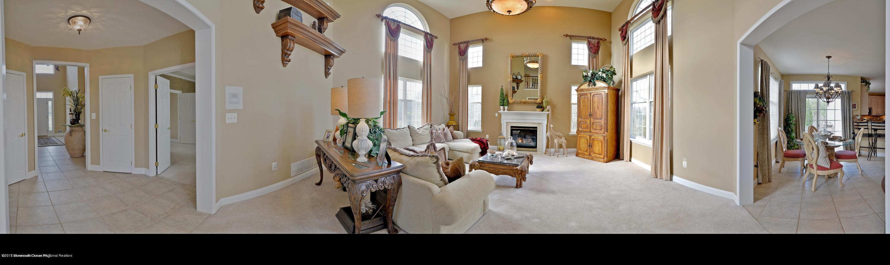 8 Rodeo Drive Jackson, NJ 08527 - Photo 52 of 54 a view of a livingroom with furniture and floor to ceiling window