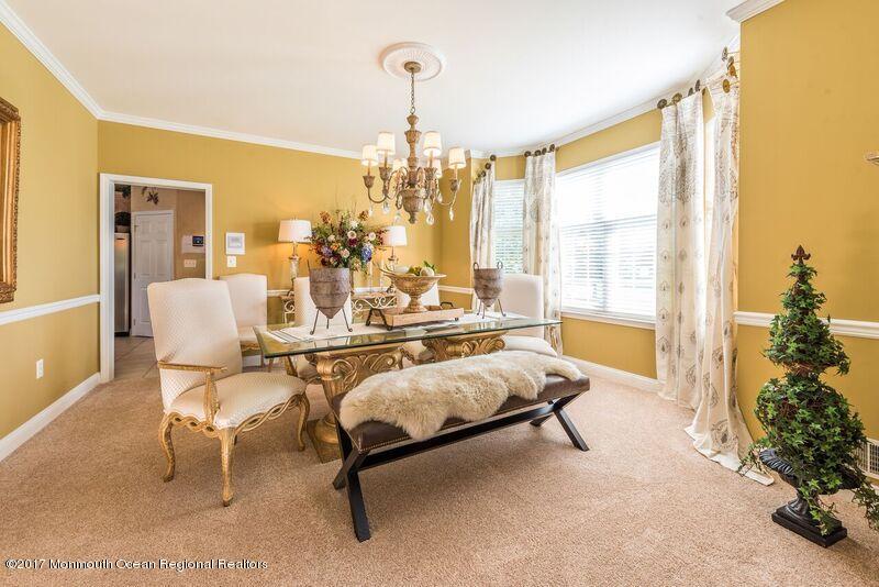 8 Rodeo Drive Jackson, NJ 08527 - Photo 6 of 54 a living room with furniture and a large window
