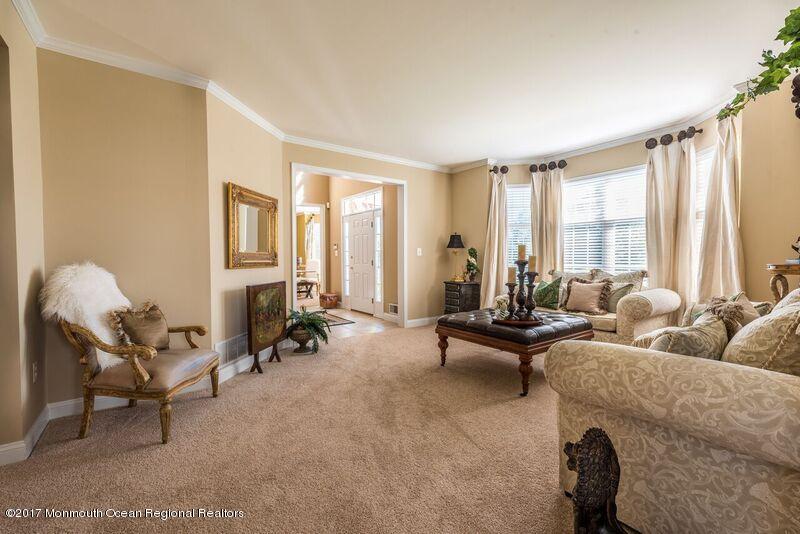 8 Rodeo Drive Jackson, NJ 08527 - Photo 7 of 54 a living room with furniture and a large window