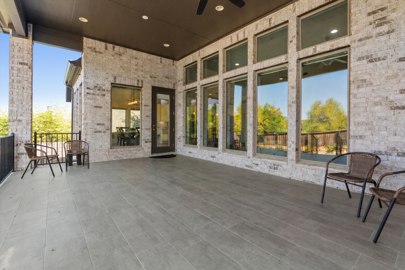 101 Pienza Drive Georgetown, TX 78628 - Photo 35 of 40 a view of a hall with wooden floor and furniture