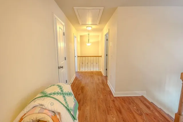 a view of a bedroom with a hallway