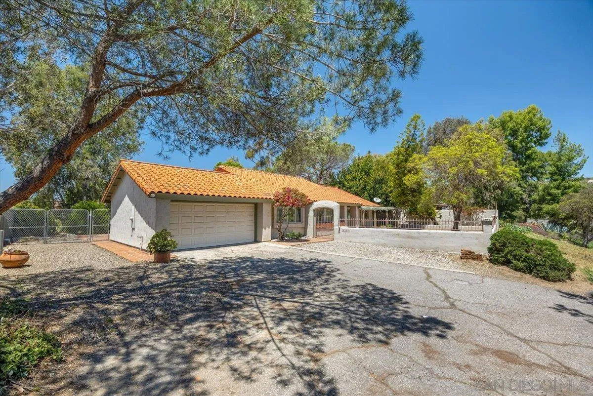 3316 Del Charro Road Jamul, CA 91935 - Photo 34 of 45 a view of a house with a yard