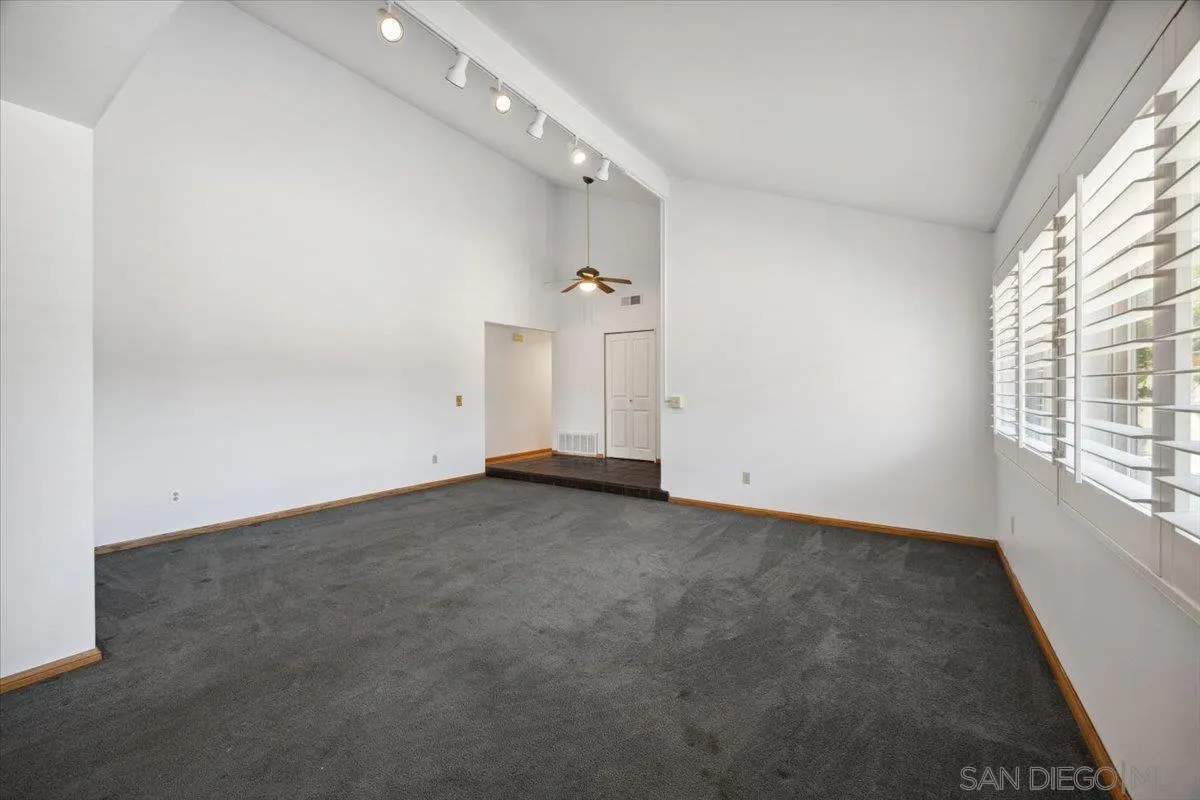 3316 Del Charro Road Jamul, CA 91935 - Photo 10 of 45 an empty room with windows and entrance
