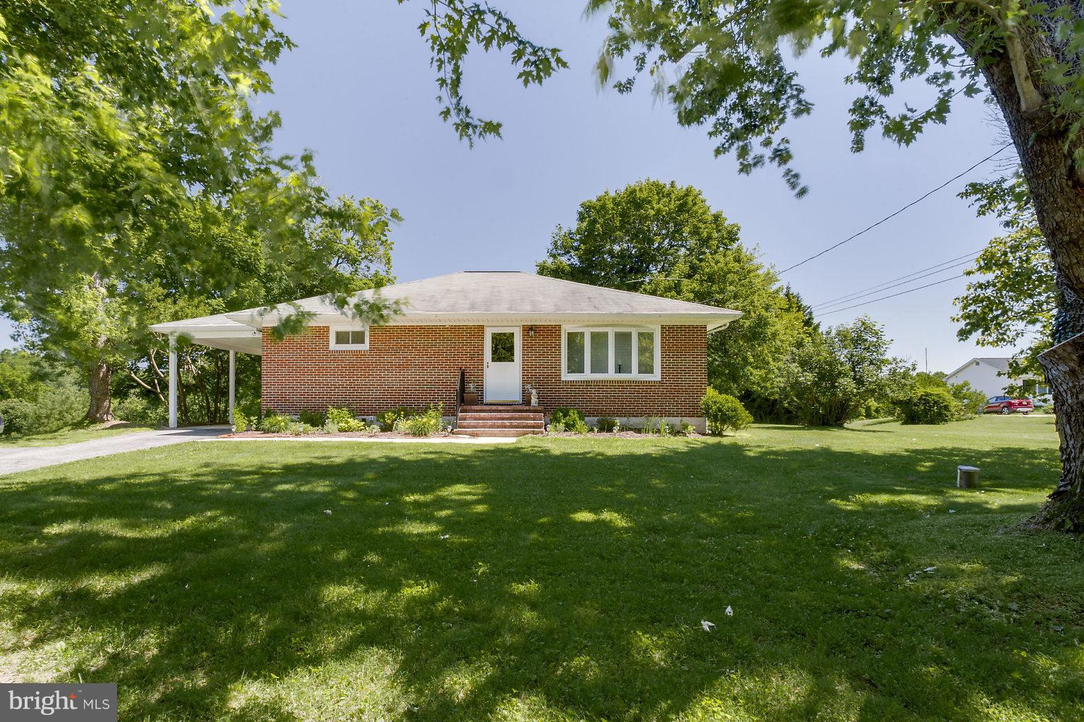 8414 Dogwood Road Baltimore, MD 21244 - Photo 1 of 29 a front view of house with yard and green space