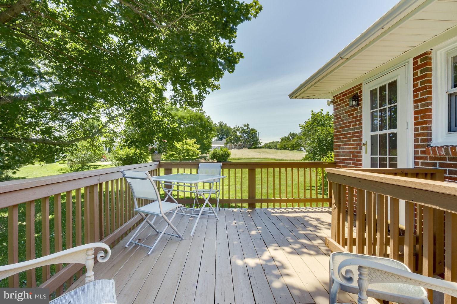 8414 Dogwood Road Baltimore, MD 21244 - Photo 17 of 29 a view of balcony with wooden floor and fence
