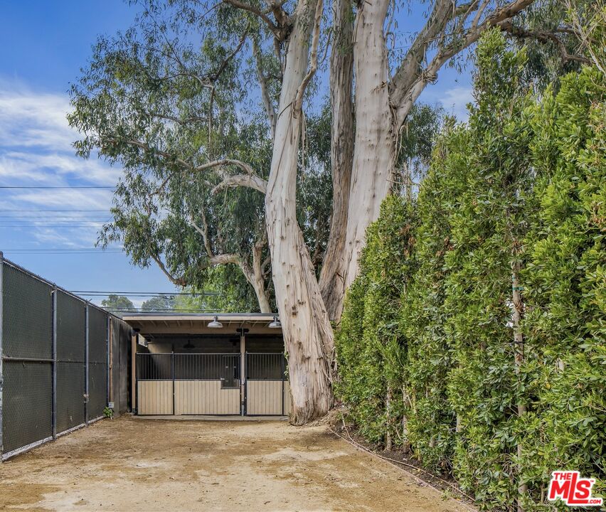 1508 Old Oak Road Los Angeles, CA 90049 - Photo 47 of 63 a house with a tree in front of it