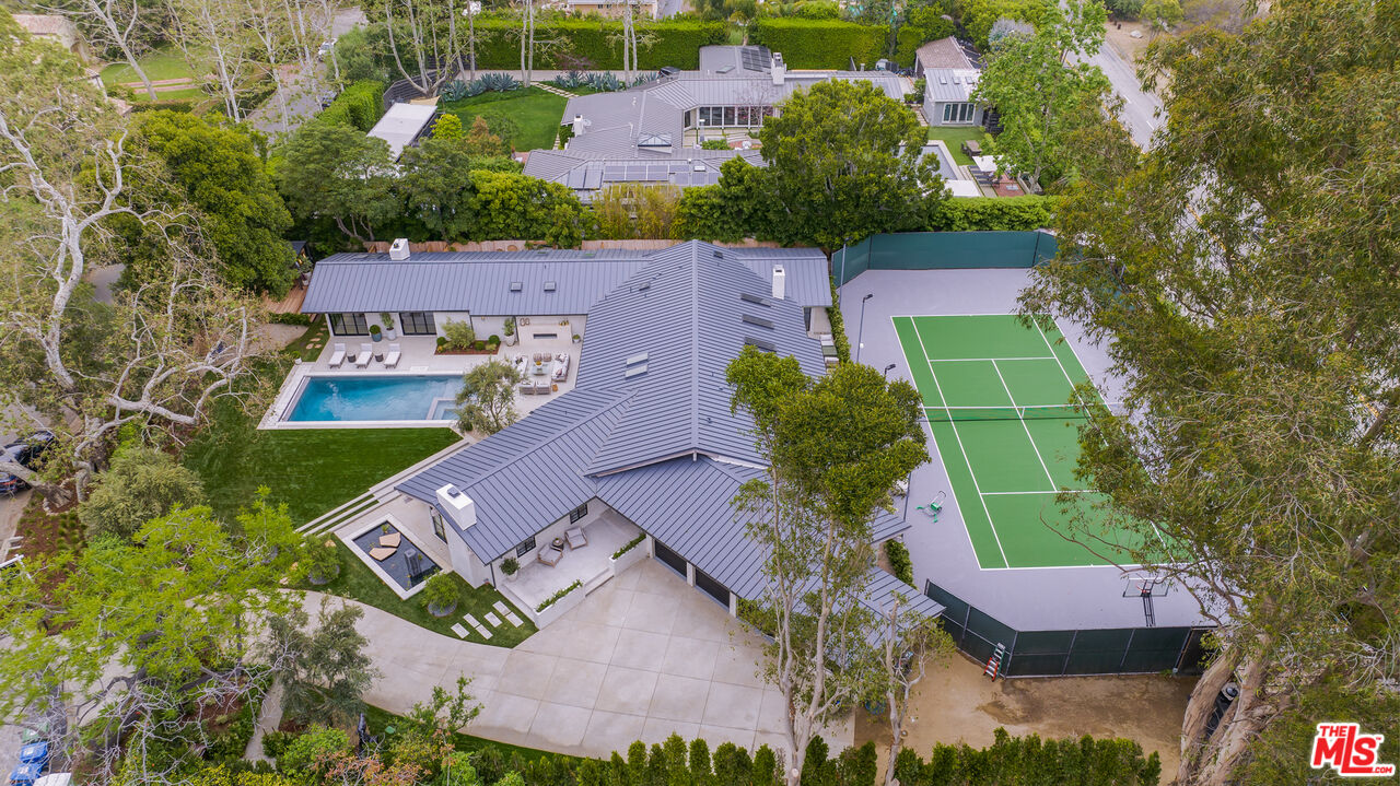1508 Old Oak Road Los Angeles, CA 90049 - Photo 50 of 63 an aerial view of a house with outdoor space and street view
