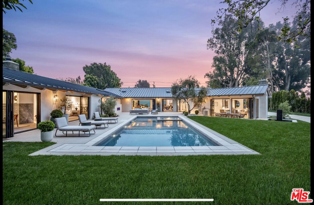 1508 Old Oak Road Los Angeles, CA 90049 - Photo 58 of 63 a view of a house with a yard porch and sitting area