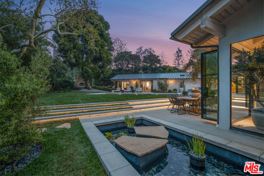 1508 Old Oak Road Los Angeles, CA 90049 - Photo 61 of 63 a view of house with swimming pool outdoor seating