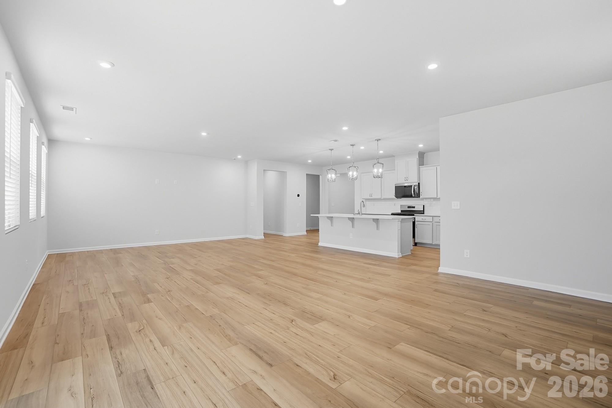 1505 Miriam Way Monroe, NC 28112 - Photo 12 of 29 a view of kitchen with wooden floor