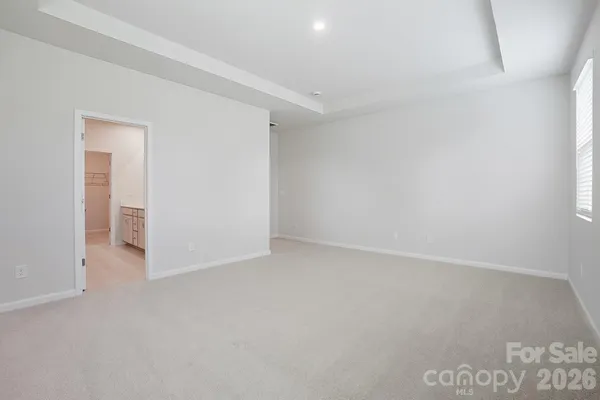 a bathroom with a double vanity sink mirror and shower