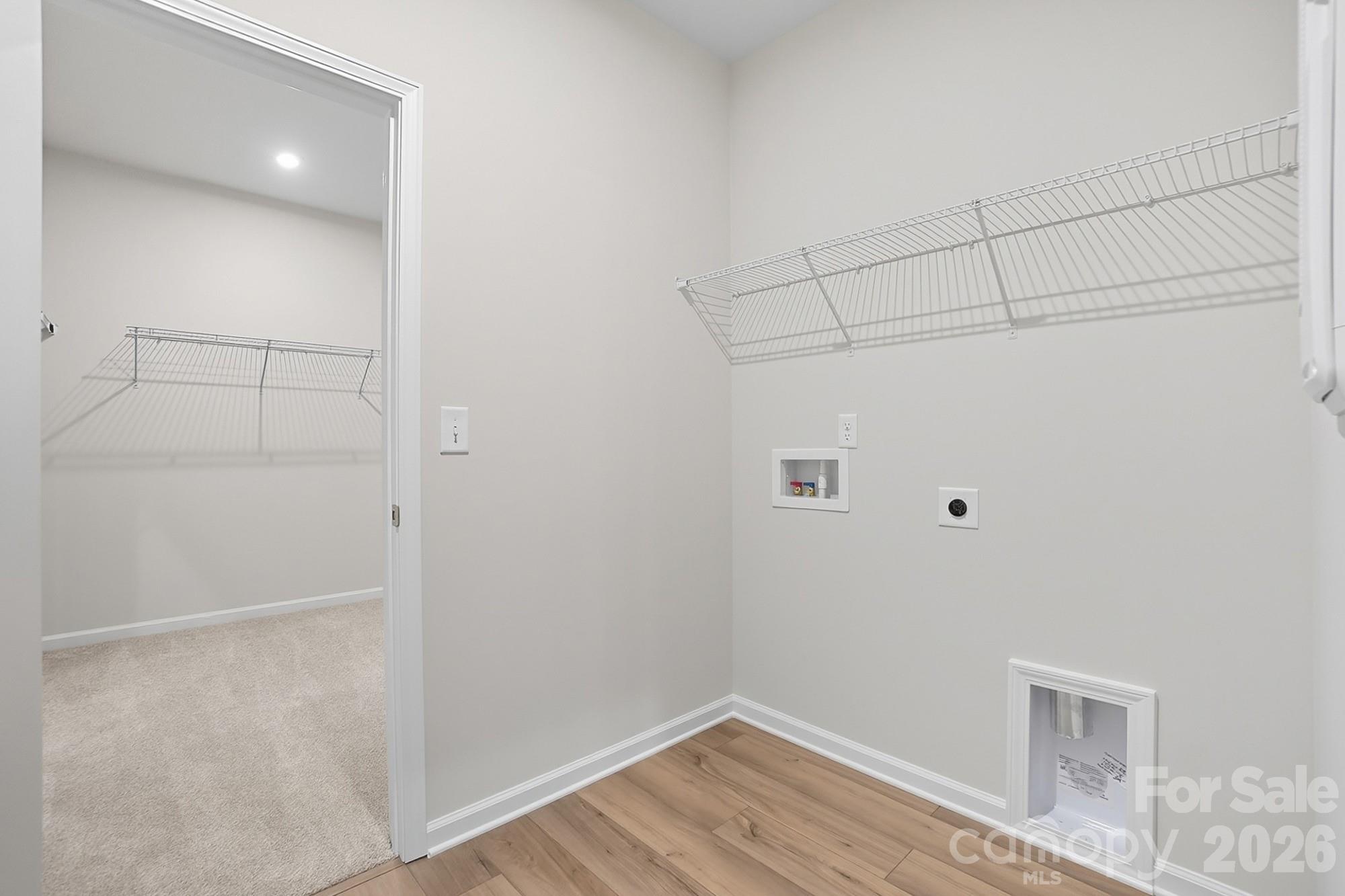 1505 Miriam Way Monroe, NC 28112 - Photo 20 of 29 a view of a room with racks on the wall