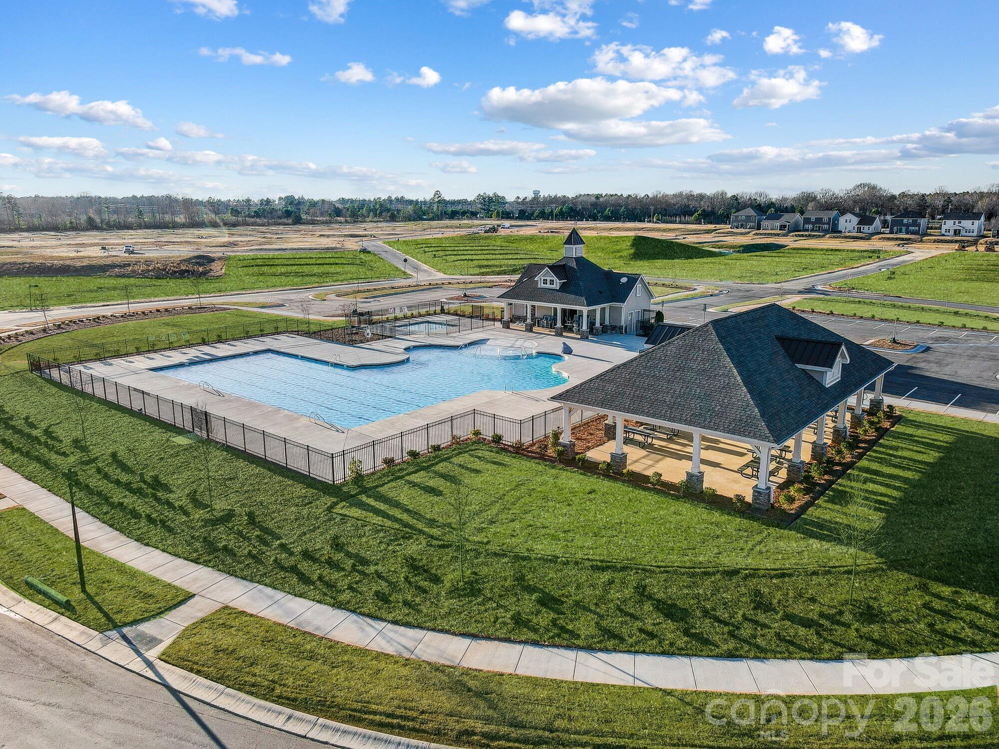 1505 Miriam Way Monroe, NC 28112 - Photo 29 of 29 a view of a swimming pool and a yard