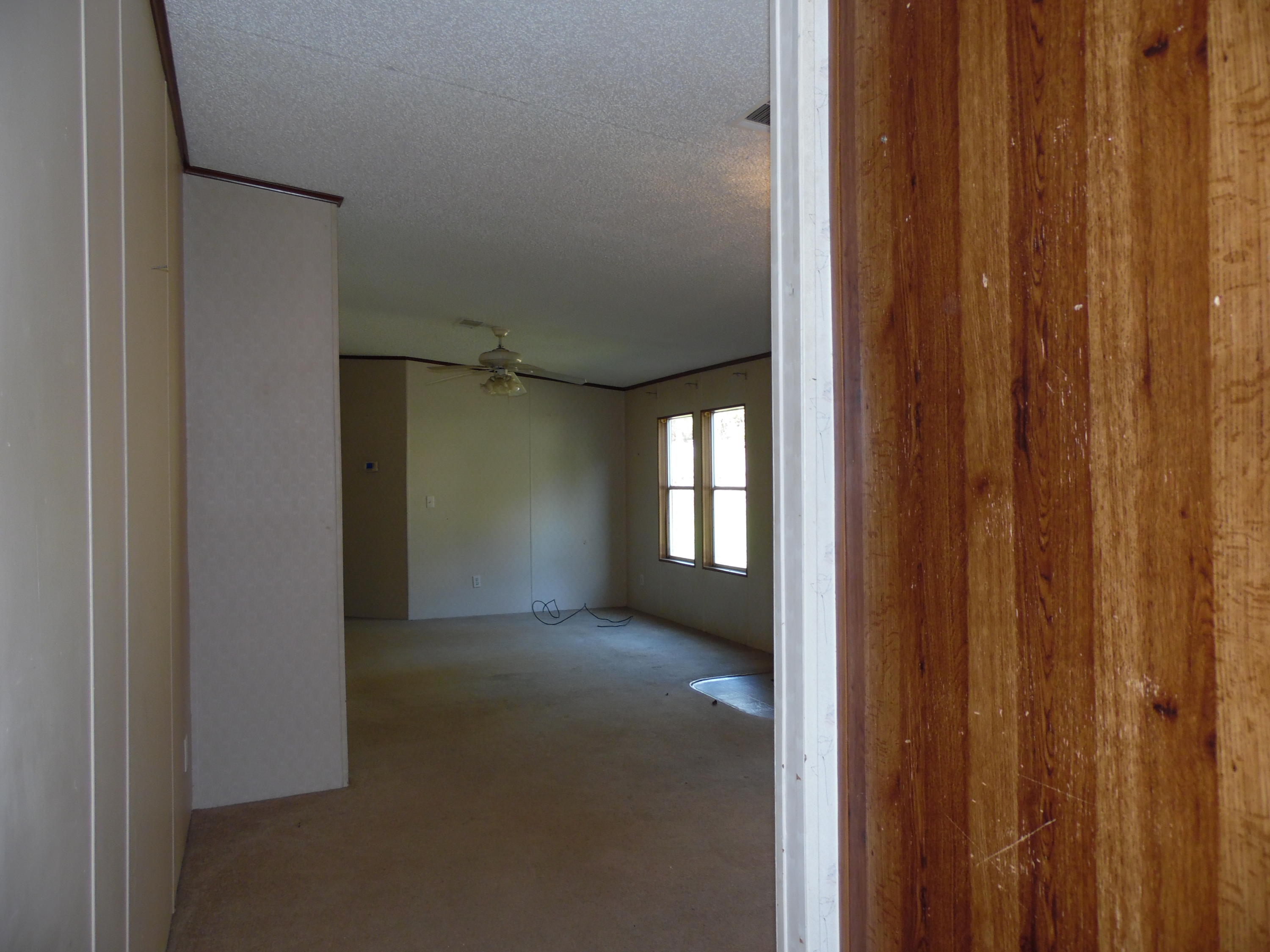 723 Squirrel Road DeFuniak Springs, FL 32433 - Photo 23 of 33 a view of hallway with windows