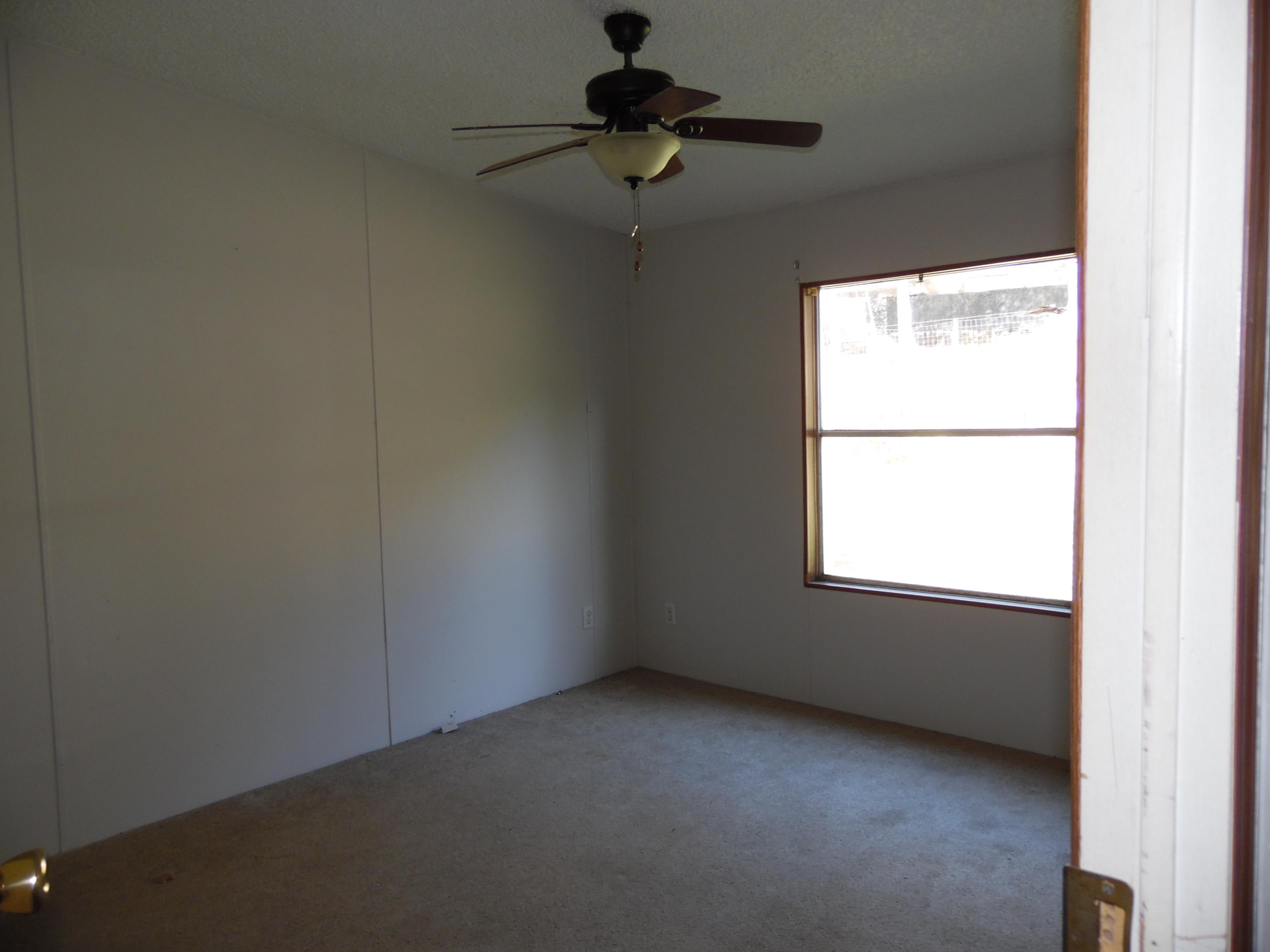 723 Squirrel Road DeFuniak Springs, FL 32433 - Photo 26 of 33 a view of an empty room with a window