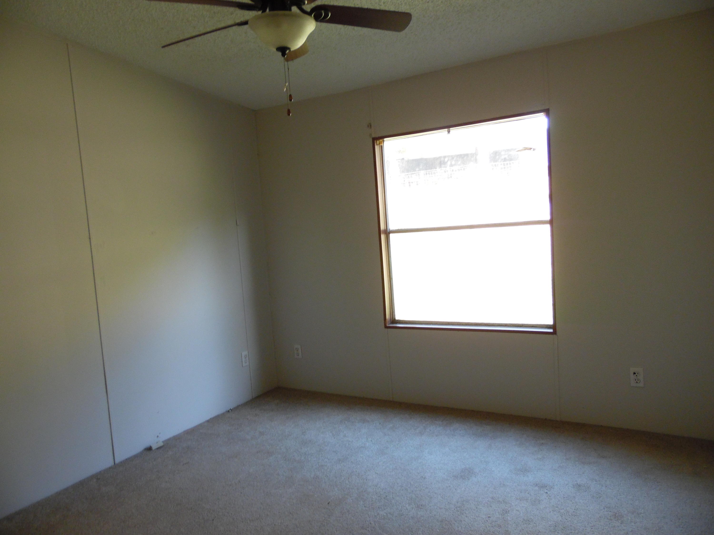 723 Squirrel Road DeFuniak Springs, FL 32433 - Photo 29 of 33 an empty room with a window