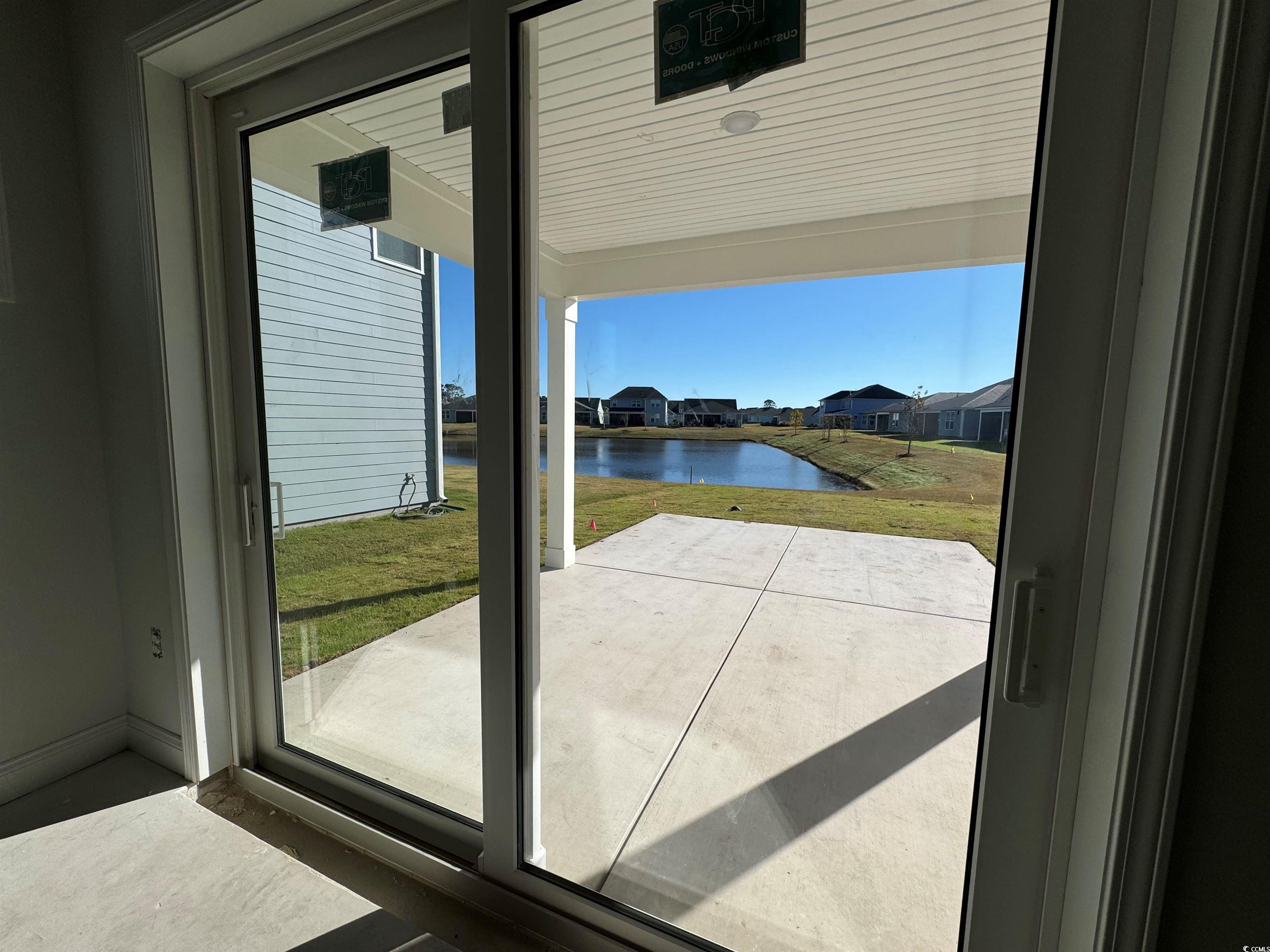 1612 Littleleaf Loop North Myrtle Beach, SC 29582 - Photo 14 of 20 Doorway featuring plenty of natural light and a wa