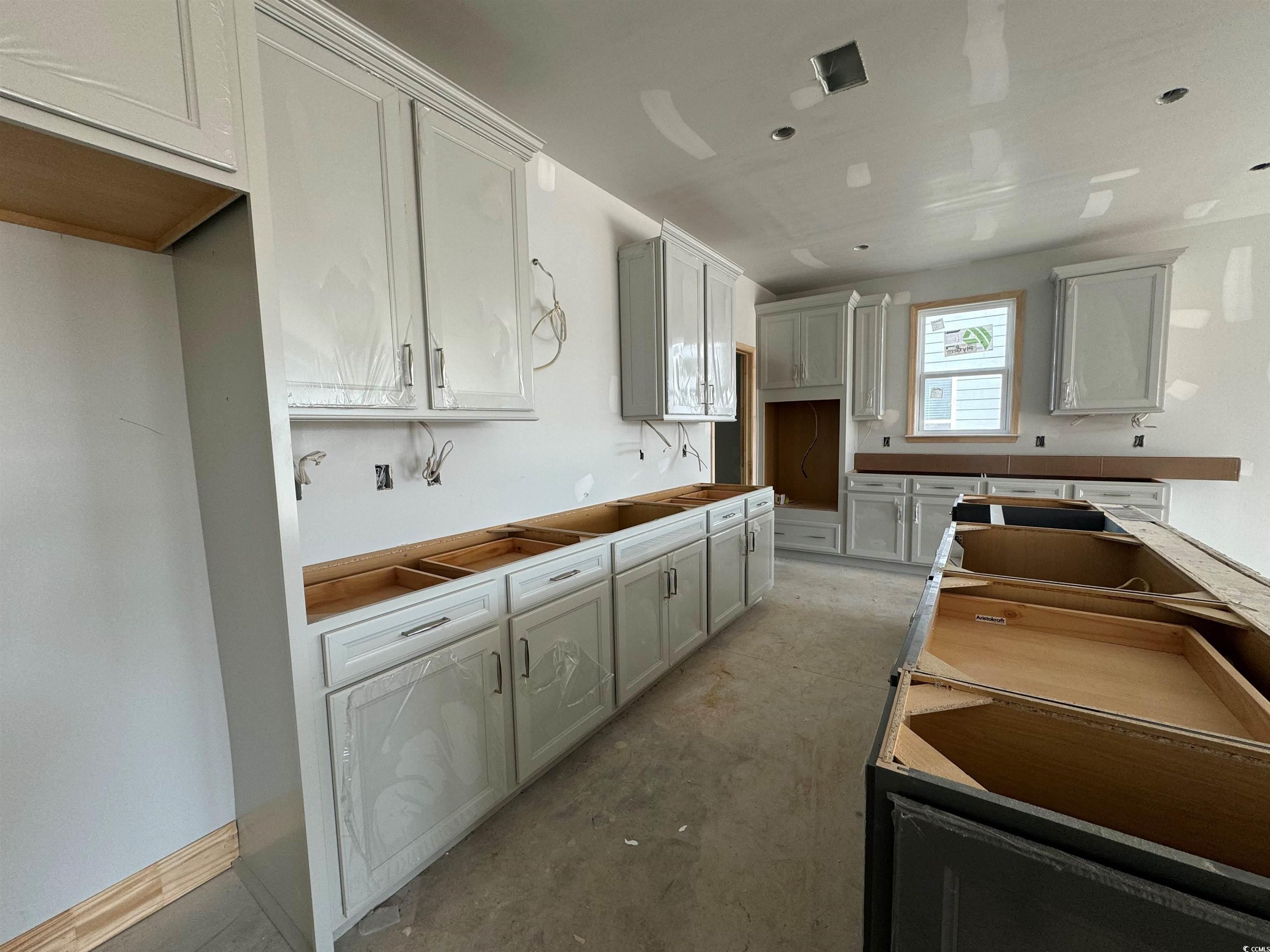 Kitchen with white cabinets