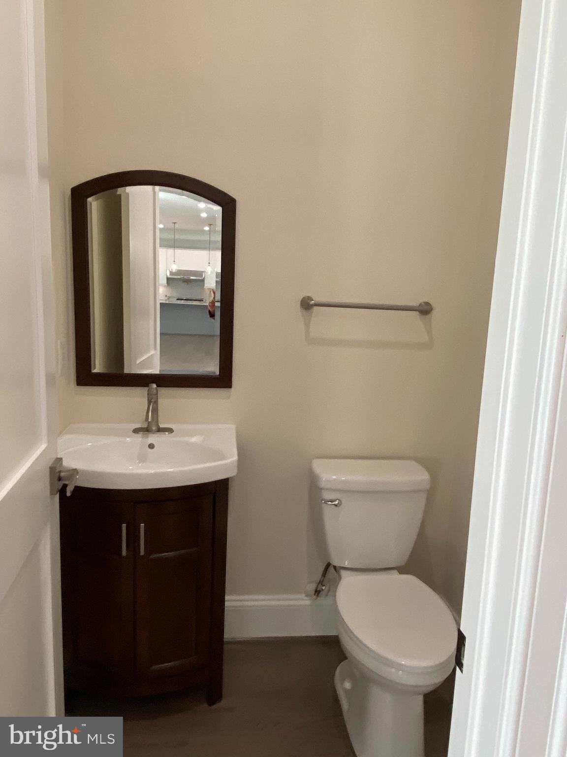 8712 Redman Street Springfield, VA 22153 - Photo 12 of 77 powder room off family room